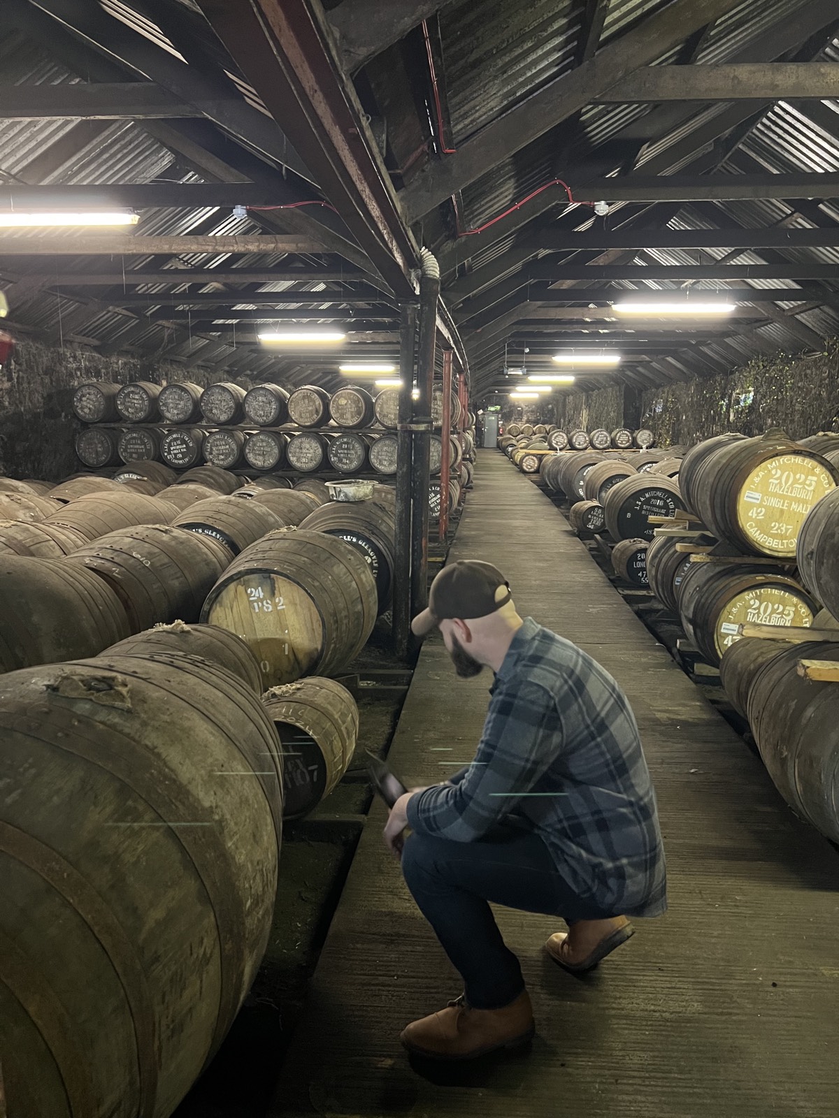 Casks maturing in a traditional dunnage warehouse